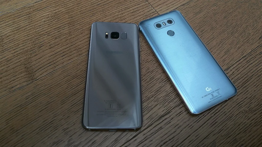 Both the phones have a glass-back body. (Photo: <b>The Quint)</b>