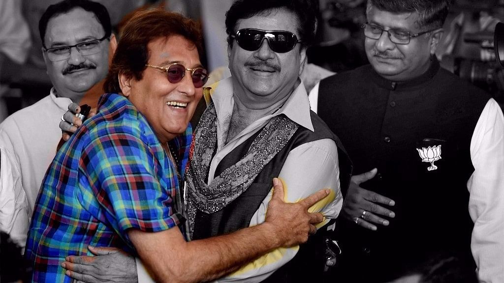 File picture of BJP MP Vinod Khanna with BJP leaders Ravi Shankar Prashad, JP Nadda and Shatrughan Sinha at BJP parliamentary party meeting at Parliament House. (Photo Courtesy: PTI/Image altered by The Quint)