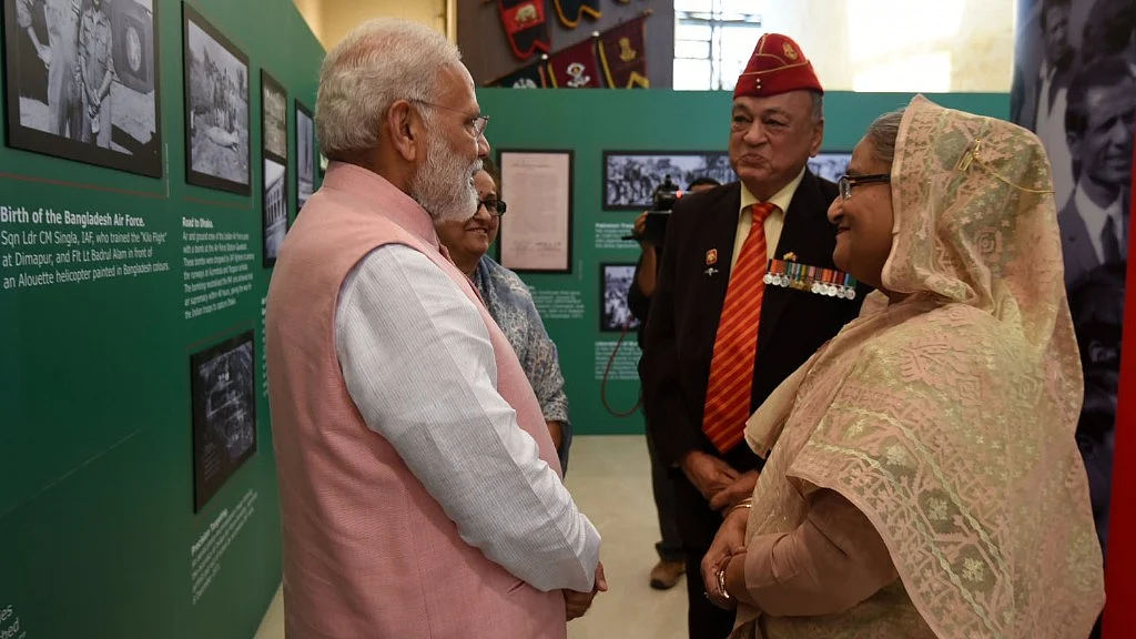PM Narendra Modi with Bangladesh Prime Minister Sheikh Hasina at a function to salute Indian Soldiers who fought in 1971 war, in New Delhi on 8 April 2017. (Photo: IANS)