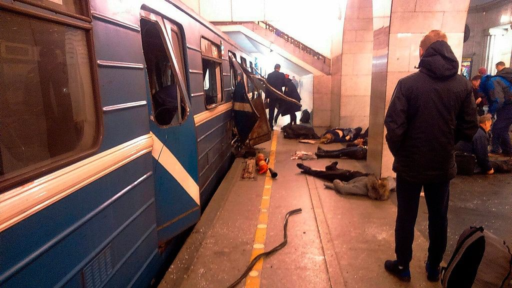 Blast victims lie near a metro train which was rocked by a blast at the Tekhnologichesky Institut subway station in St Petersburg, Russia. (Photo: AP)