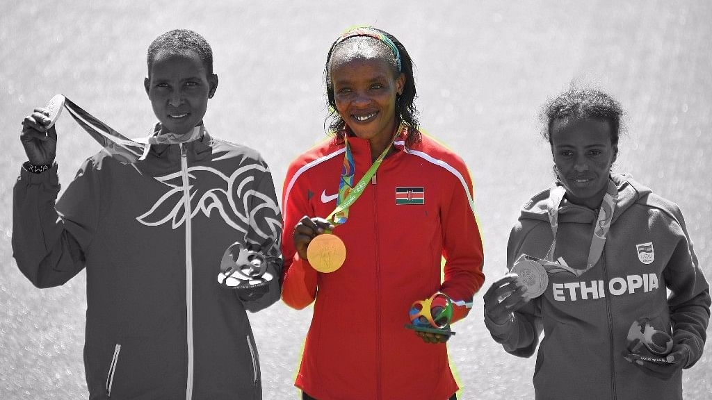 Jemima Sumgong (centre) became the first Kenyan woman to win an Olympic marathon gold at Rio. (Photo: Reuters)