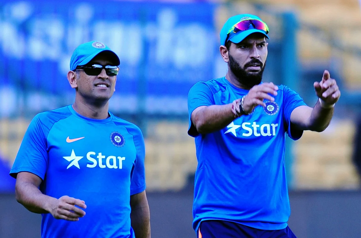 Yuvraj at a training session with MS Dhoni before the England series. (Photo: IANS)