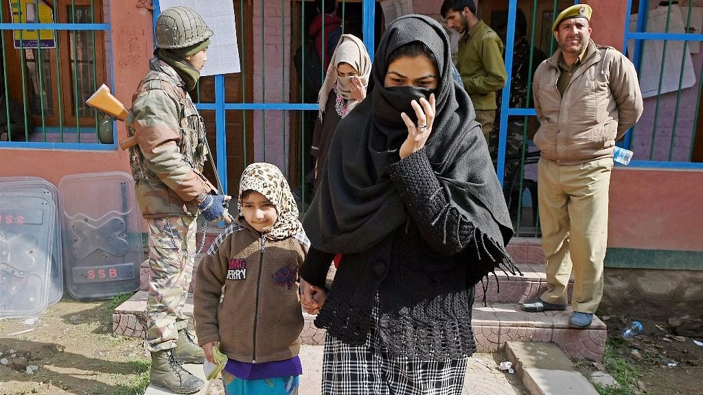 File image of a woman walking out of a polling station in J&amp;K’s Srinagar. Photo used for representation.