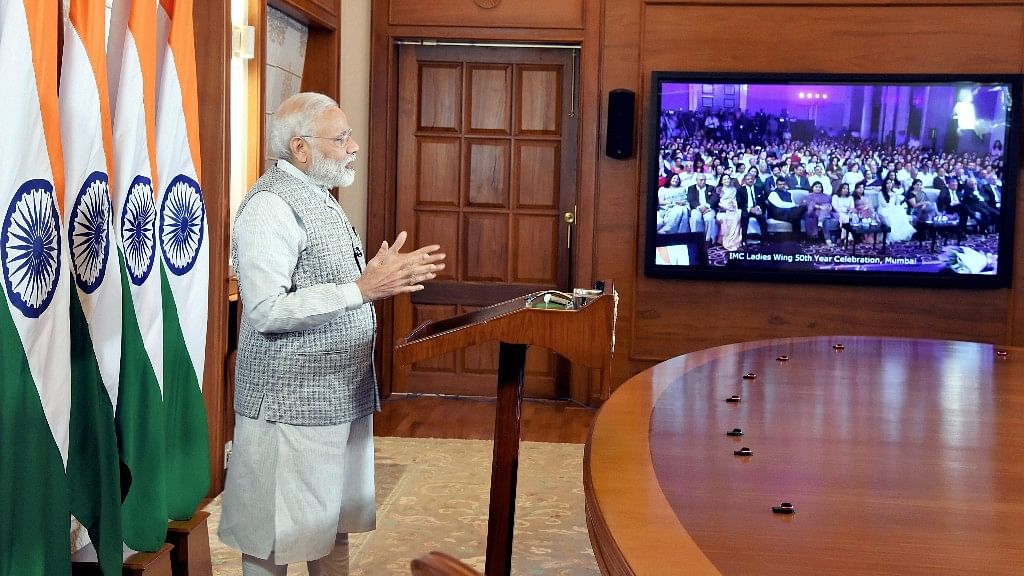 Prime Minister Narendra Modi addressing the golden jubilee celebrations of the Ladies’ Wing of the Indian Merchants Chambers via video conferencing. (Photo Courtesy: PTI)