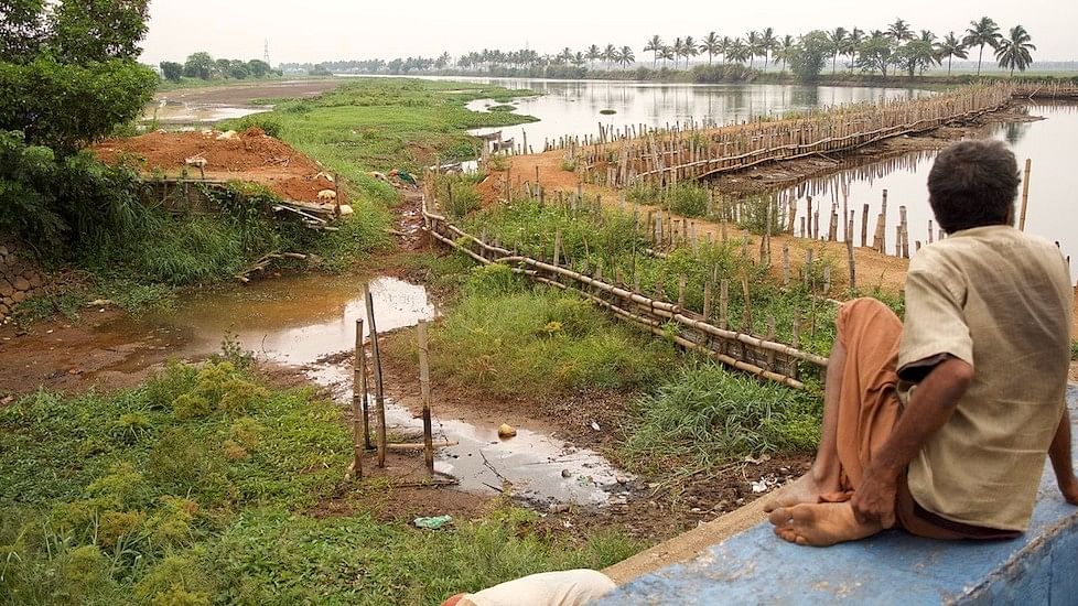 

The vast expanse of water has degenerated into smaller water patches upstream of the Enamavu barrage. (Photo Courtesy:  S Gopikrishna Warrier/The Village Square)