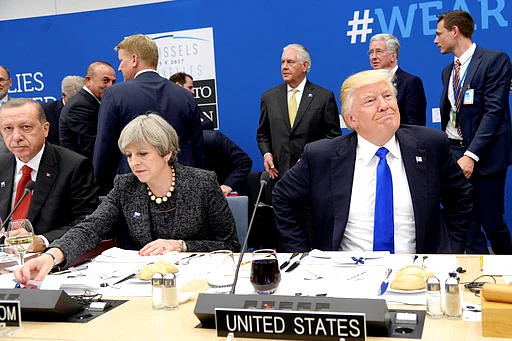 (Photo Courtesy: <a href="http://www.apexchange.com/pages/OneUp.aspx?id=68c3e6cc069a46b387bf916a87bfa723&links=TRUMP,NATO,USABL,WK21Y2017,W21Y2017&media=Photo&slug=&fid=d3253854c6564bdf8417fd7ed89d28f6">AP</a>)