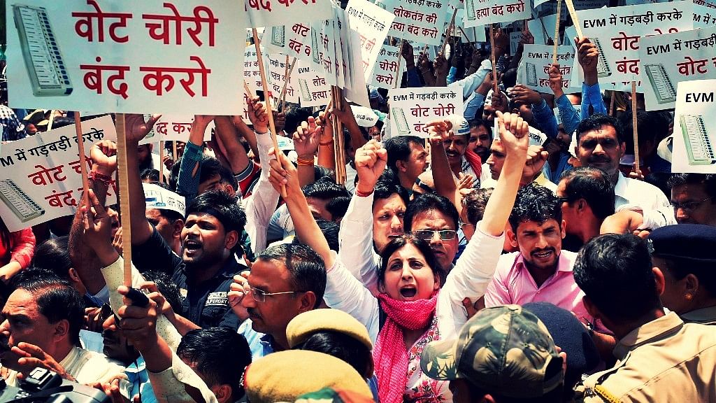 Aam Aadmi Party workers protest near the Election Commission’s office on Thursday. (Photo: PTI)