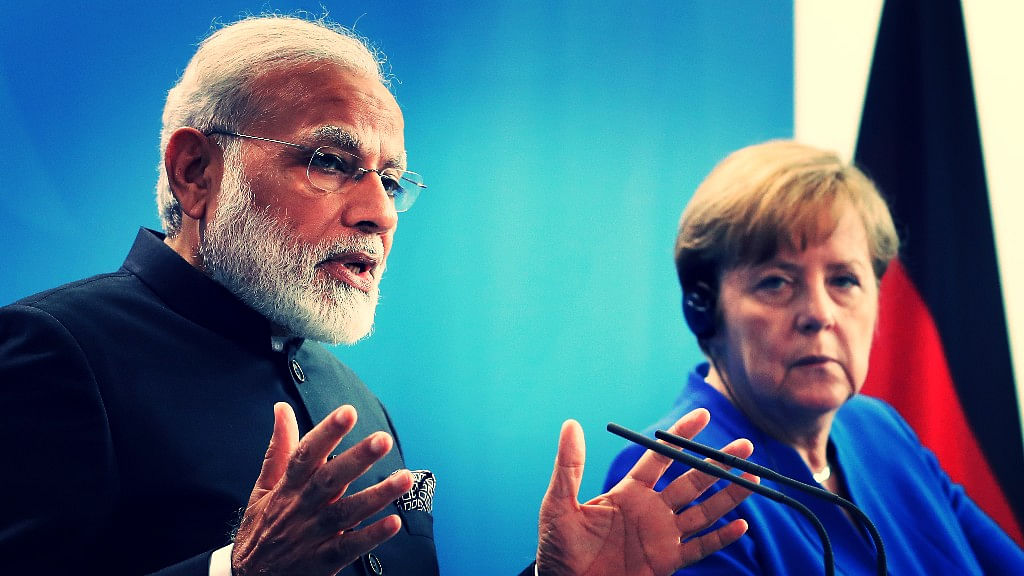 German Chancellor Angela Merkel (R) and Prime Minister Narendra Modi (L) address the media during a joint press conference in Berlin on 30 May 2017. (Photo: AP)