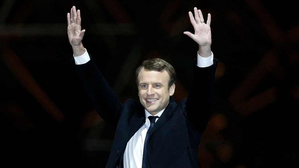 French President-elect Emmanuel Macron gestures during a victory celebration outside the Louvre museum in Paris. (Photo: AP)