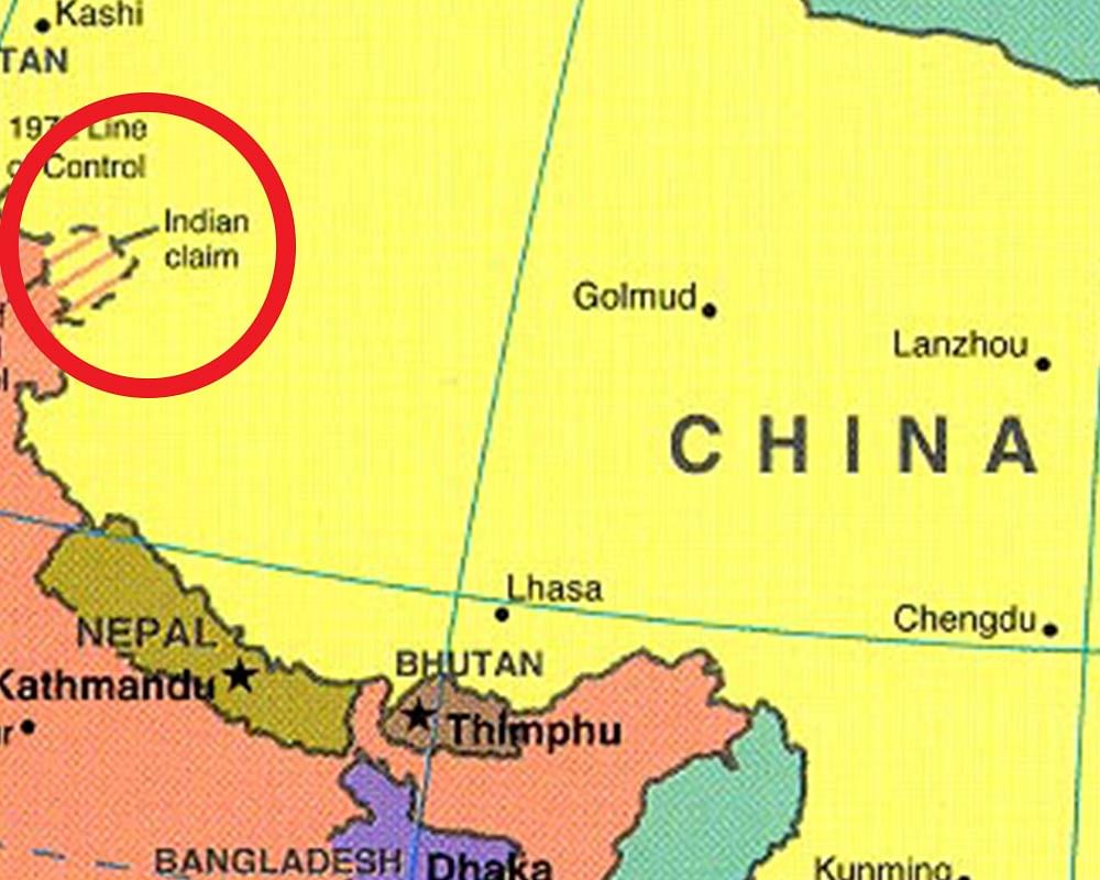 The textbook contains a map showing Aksai Chin coloured in the same yellow as China, and marked ‘Indian Claim’.
