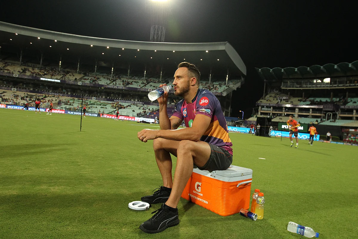 Faf du Plessis has a drink during a warm-up session. (Photo: BCCI)