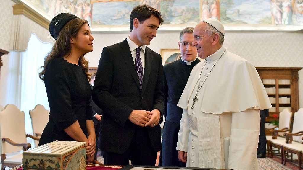 Canadian Prime Minister Justin Trudeau and his wife. Sophie Gregoire-Trudeau, meet Pope Francis  at the Vatican on Monday. (Photo: AP)