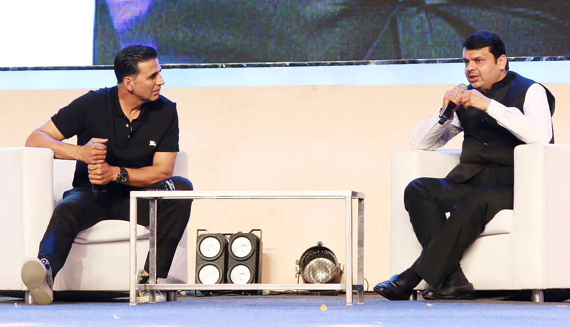 The Chief Minister addresses the audience as Akshay looks on. (Photo: Yogen Shah)