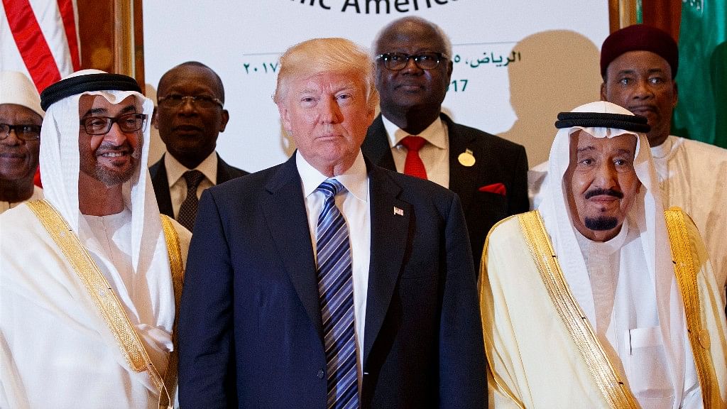 US President Donald Trump poses for photos with King Salman (right) and others at the Arab Islamic American Summit in Riyadh on Sunday. (Photo: AP)