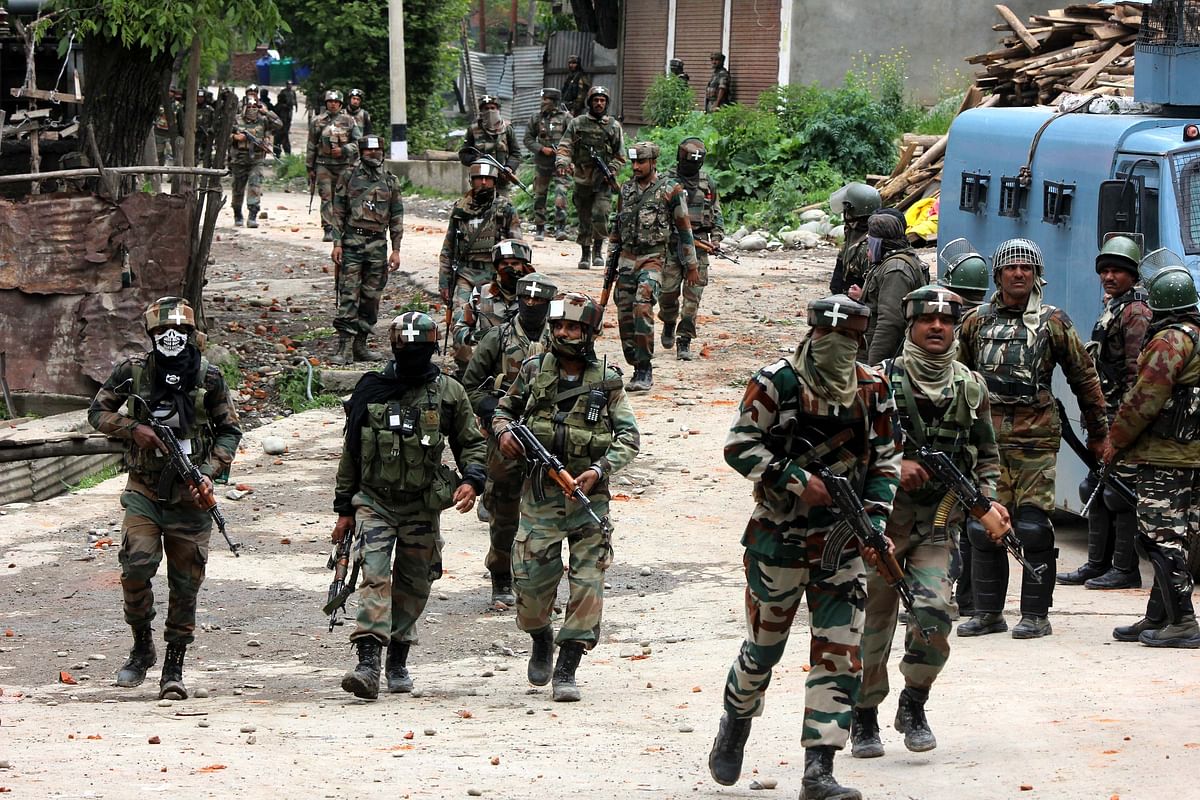 Scores of security forces were deployed in Shopian district of Kashmir for the anti-militancy crackdown.