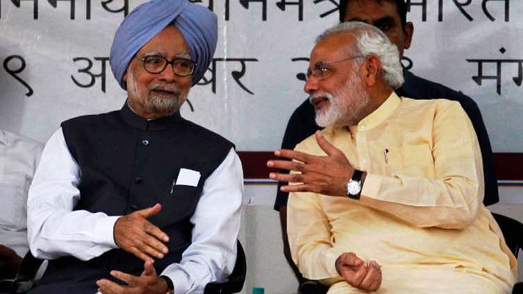 Former prime minister Manmohan Singh (left) with Prime Minister Narendra Modi (right). (Photo: Reuters)