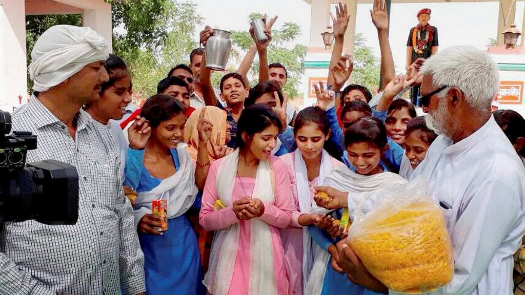 Girl students break their fast and celebrate in Rewari (Photo: PTI)