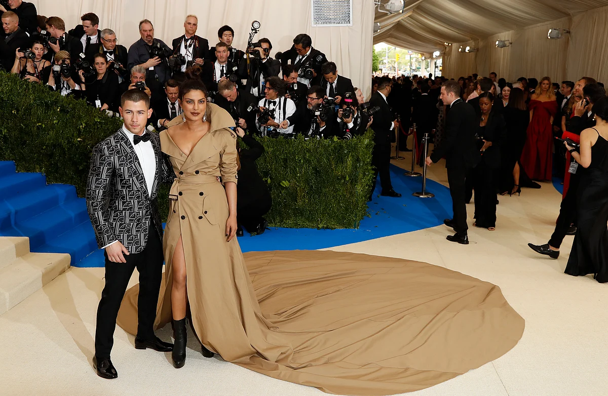 PeeCee poses with singer-actor Nick Jonas. (Photo: Reuters)