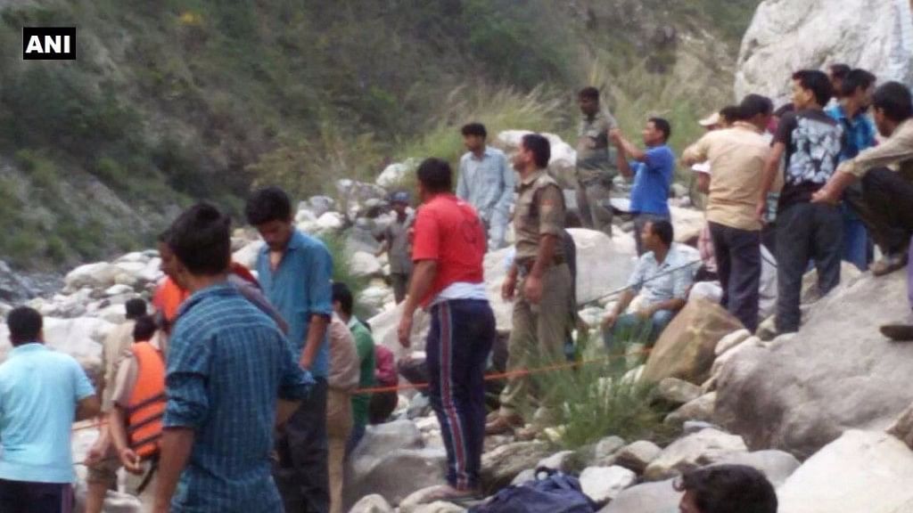 Rescue operations in Uttarkashi after a bus fell into a river. (Photo: PTI)