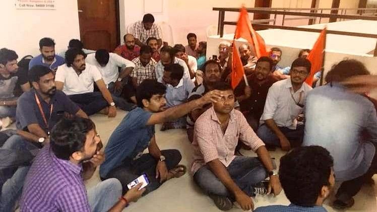 Workers hold a protest at Sun TV’s Kochi office. (Photo Courtesy: The News Minute)&nbsp;