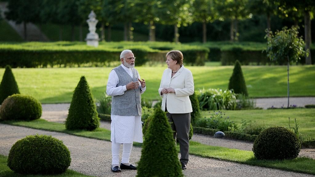 Prime Minister Narendra Modi with German Chancellor Angela Merkel. (Photo: AP)