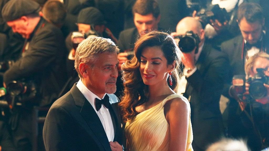 Amal and George Clooney at an awards night.&nbsp;