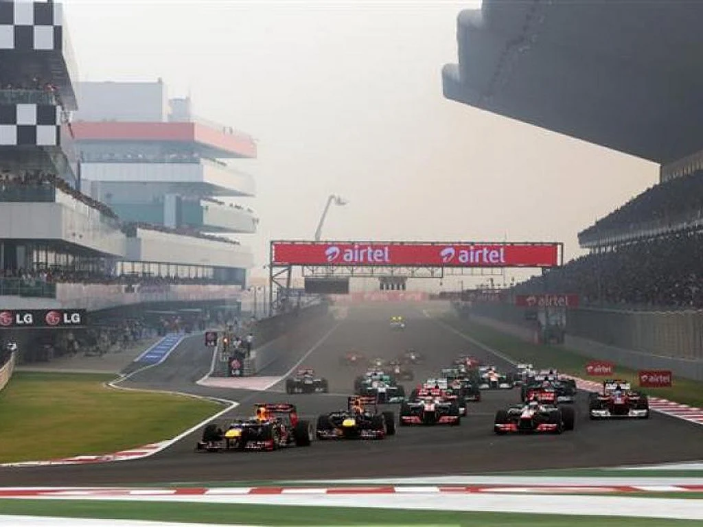 Sebastian Vettel, then of Red Bull Racing leads the field into the first corner at the start of the Indian Grand Prix at the Buddh International Circuit, on 28 October 2012. (Photo Courtesy: Buddh International Circuit)