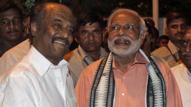 Rajinikanth (left) with PM  Narendra Modi (right). (Photo: Reuters)