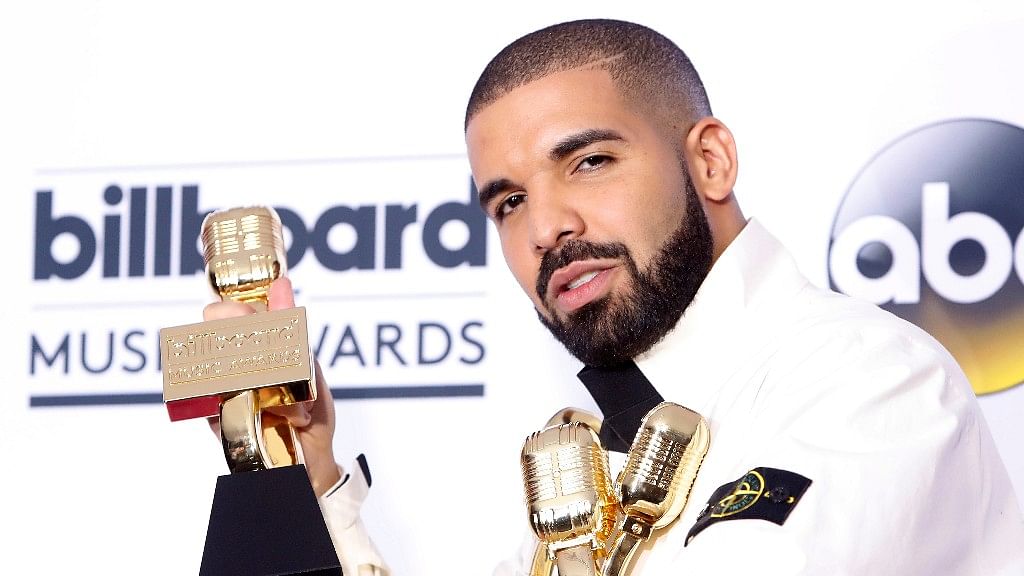 Drake shows off his awards. (Photo: Reuters)