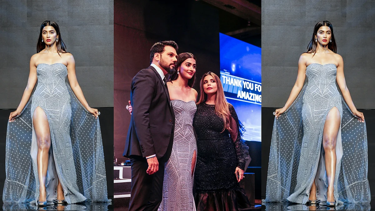 Falguni Shane Peacock with showstopper Pooja Hegde in the dress that was created with help from IBM Watson (Photo: IBM)