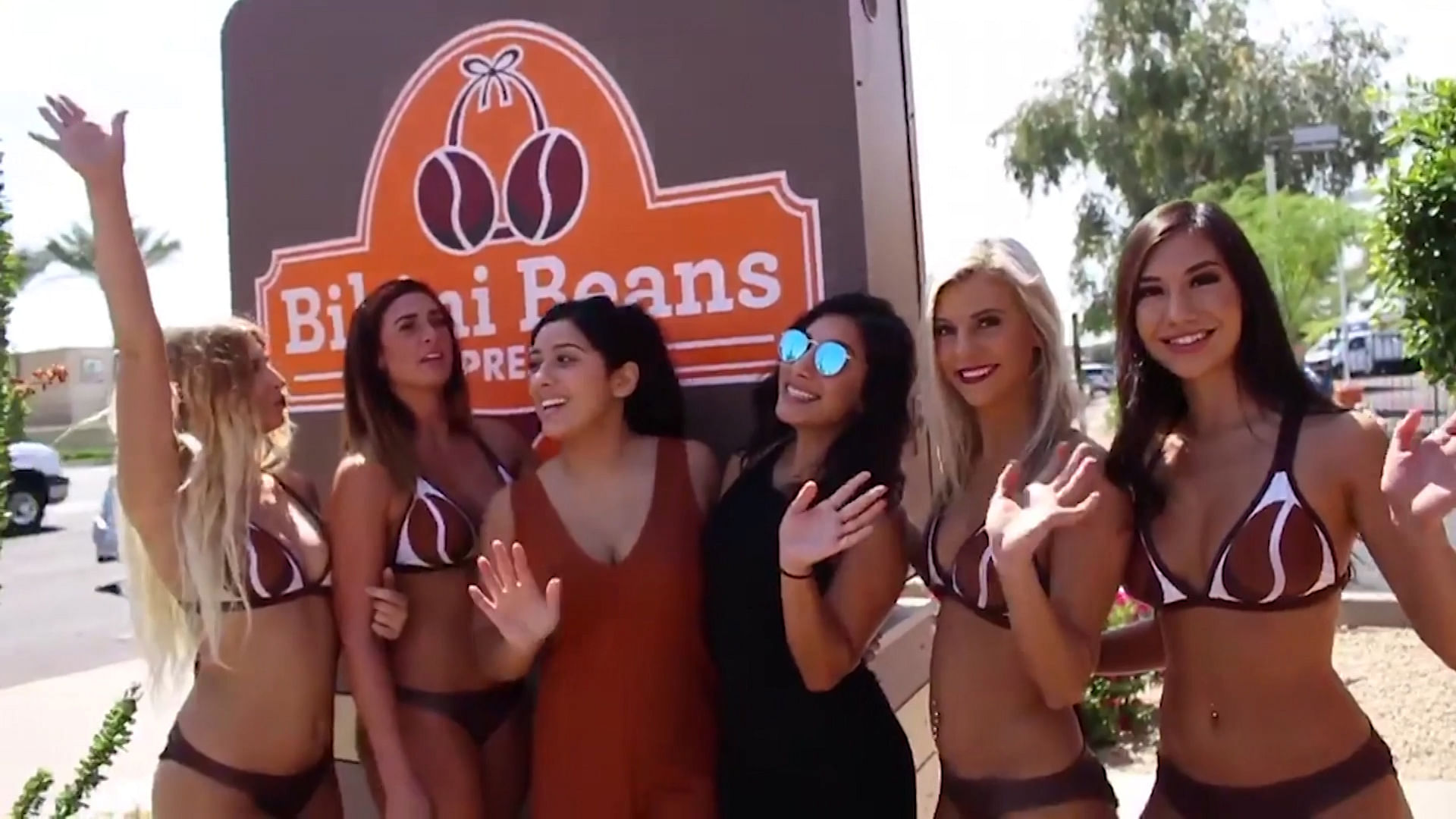 The staff at ‘Bikini Beans Espresso’, a beach-side coffee shop in Arizona, USA (Photo: AP/Caters Screengrab)