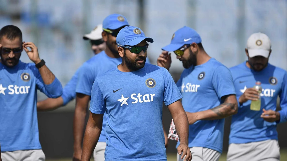 Rohit Sharma (centre) along with Ajinkya Rahane can certainly be a calming influence on the excitable Virat Kohli in Tests.