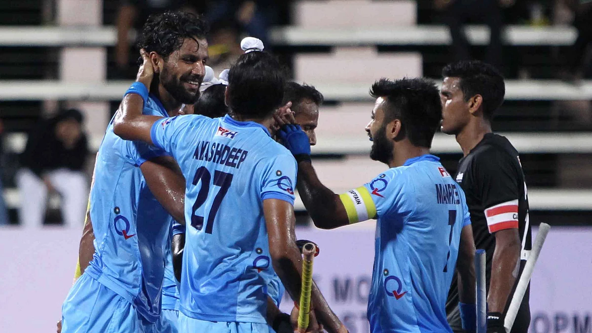 Rupinder Pal Singh celebrates a goal with his teammates. (Photo: Hockey India)