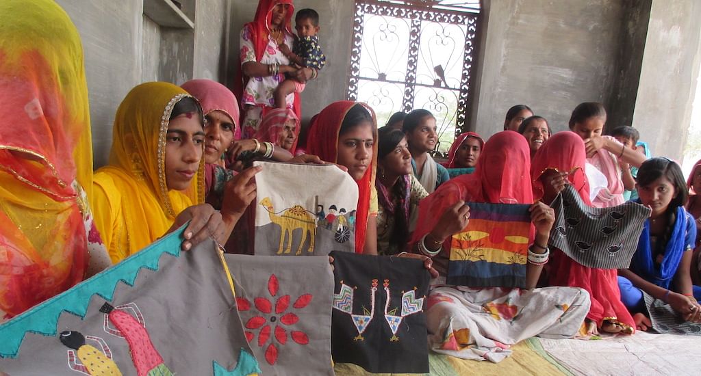  Dandkala village’s women, despite being refugees, are now earning for their families through embroidery.