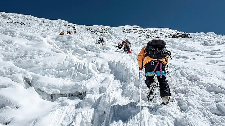 Climbers climbing the ice wall to the top of Island Peak (Imja Tse) summit (6189m) in the Everest region, Nepal. (Photo: iStock)