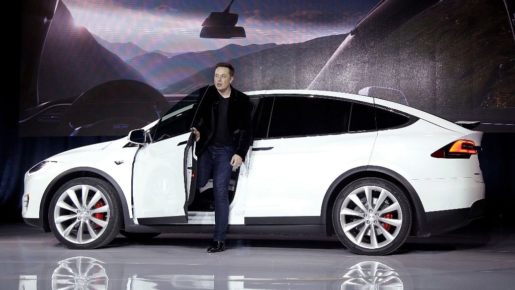 Elon Musk, Founder, Tesla stepping out of Model X. (Photo: AP)