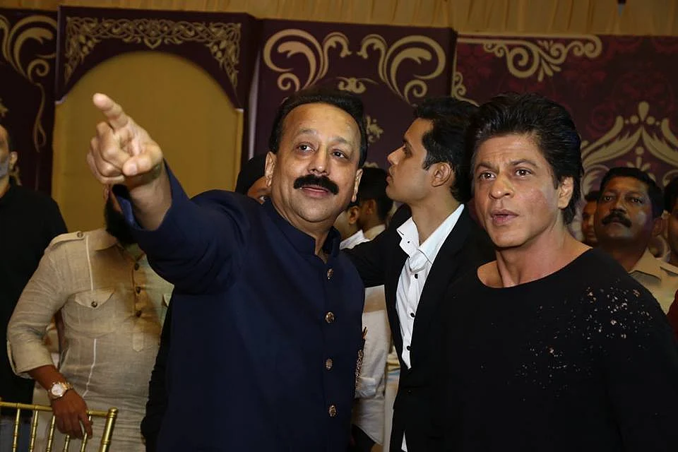 Baba Siddique with Shah Rukh Khan. (Photo courtesy: <a href="https://www.facebook.com/BabaSiddique/photos/a.1055368967888758.1073742109.441249902634004/1060006937424961/?type=3&theater">Facebook/ babasiddique</a>)