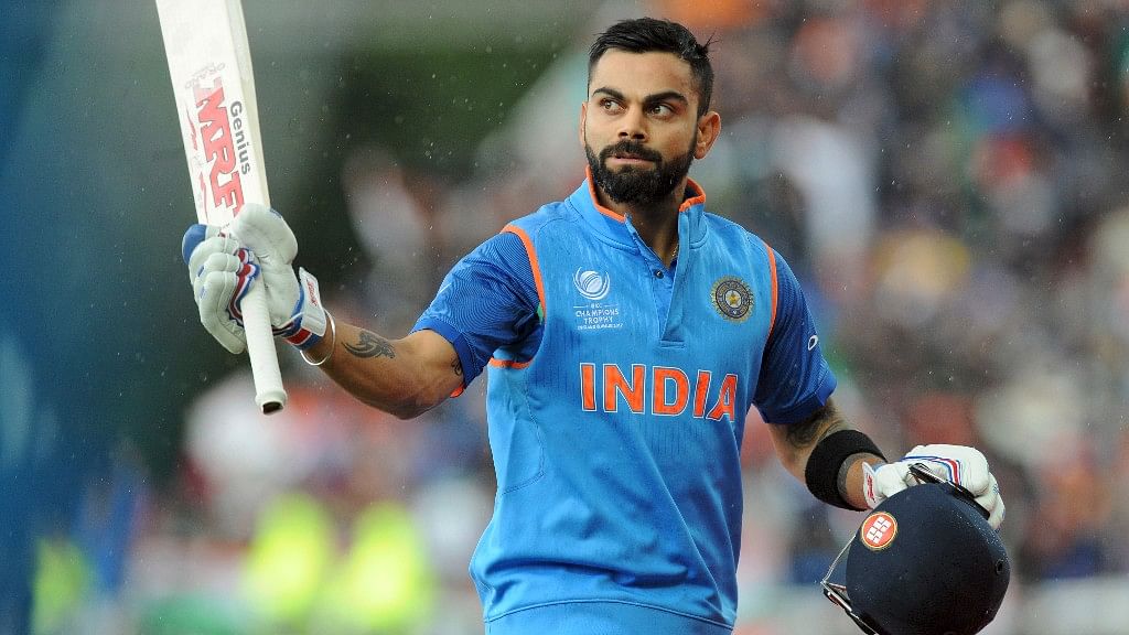 

Indian cricket captain Virat Kohli leaves the field at the end of an innings during the ICC Champions Trophy match between India and Pakistan. (Photo: AP)