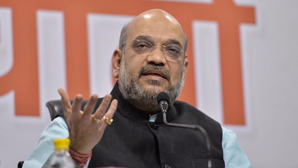 BJP chief Amit Shah addressing party workers after laying the foundation stone for a 53,000 sq.ft. party headquarters in Thiruvananthapuram. (Photo: IANS)