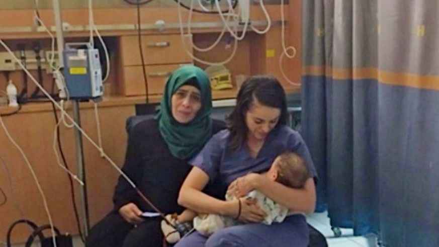 (Photo: Facebook/<a href="http://hadassahinternational.org/hadassah-jewish-nurse-breastfeeds-baby-injured-palestinian-mom/">hadassahinternational</a>)