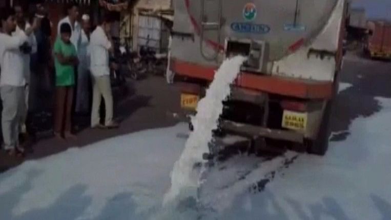 Gallons of milk were spilled on highways. (Photo: ANI Screengrab)