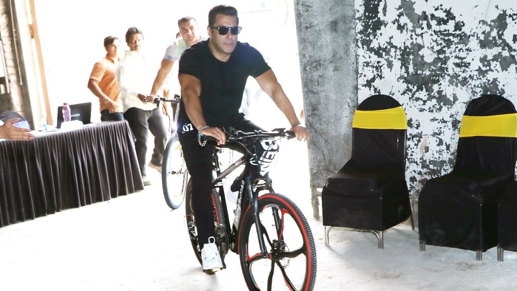 Salman Khan arrives at Mehboob Studio in style on his E-Cycle. (Photo: Yogen Shah)