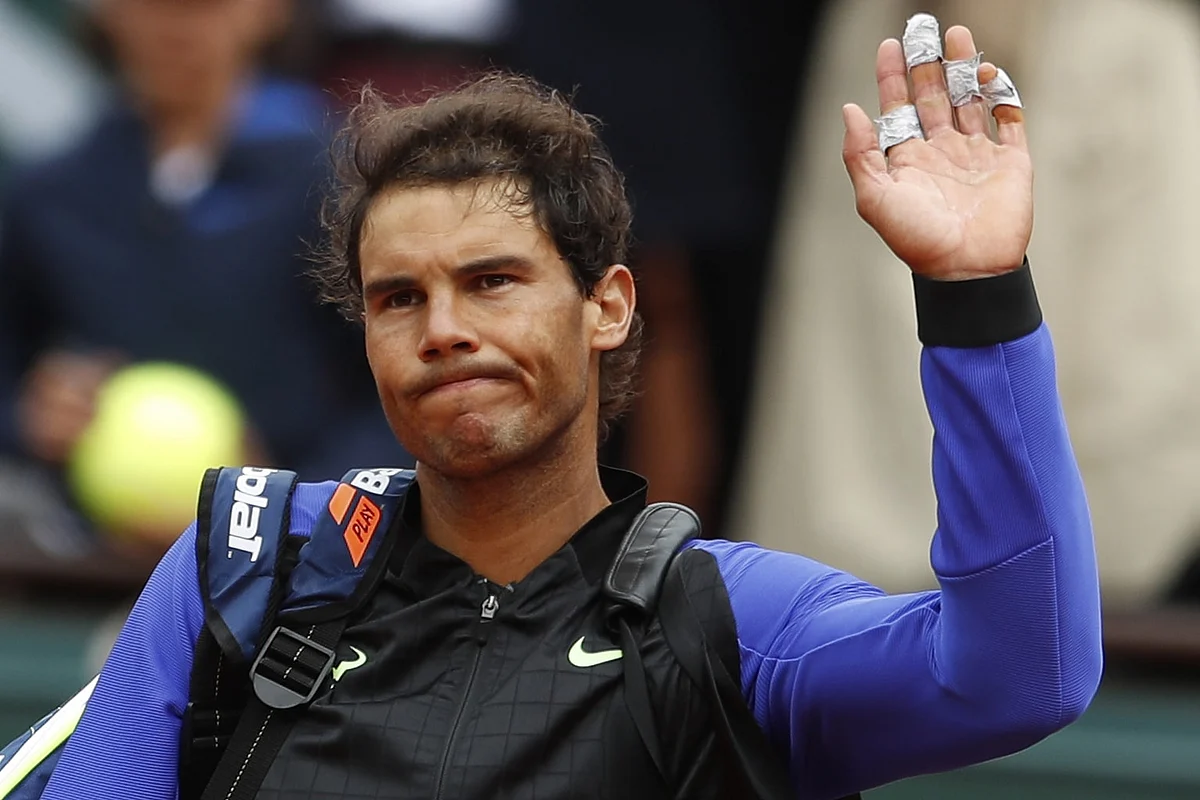 Rafael Nadal waves to the crowd after he booked his spot in the semi-finals. (Photo: AP)