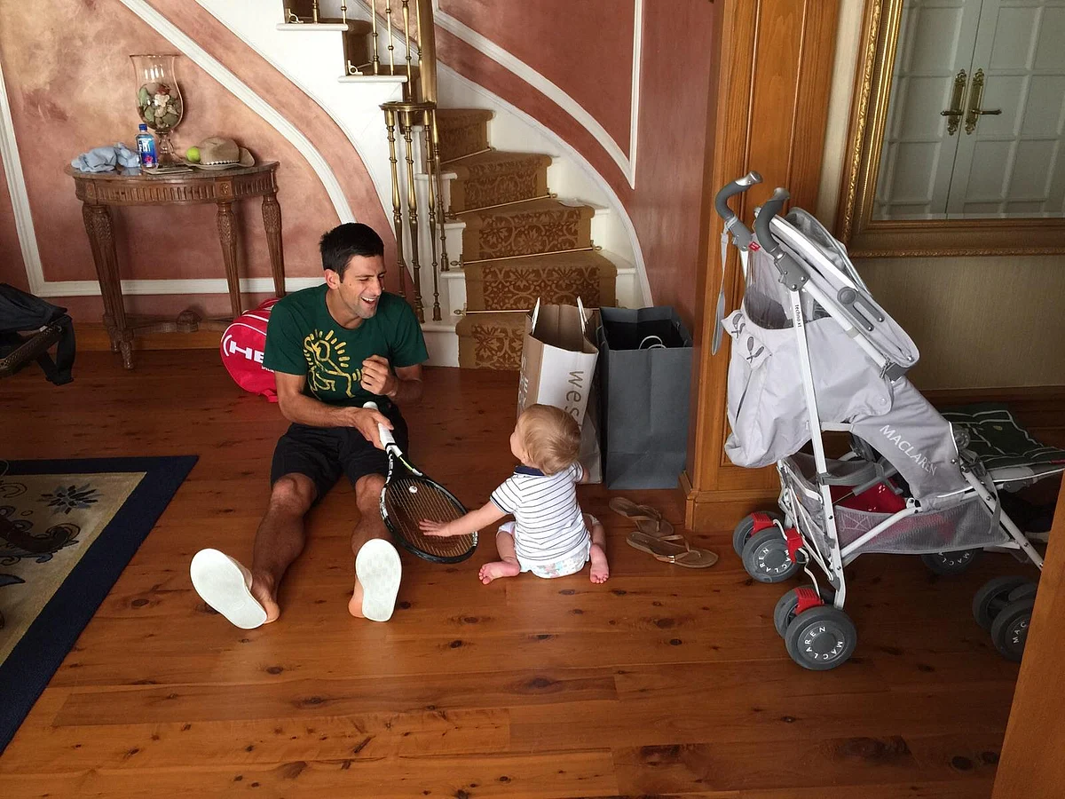 Novak Djokovic shares a laugh with his son. (Photo Courtesy: <a href="https://www.facebook.com/pg/djokovic.official/photos/?ref=page_internal">Facebook/Novak Djokovic</a>)