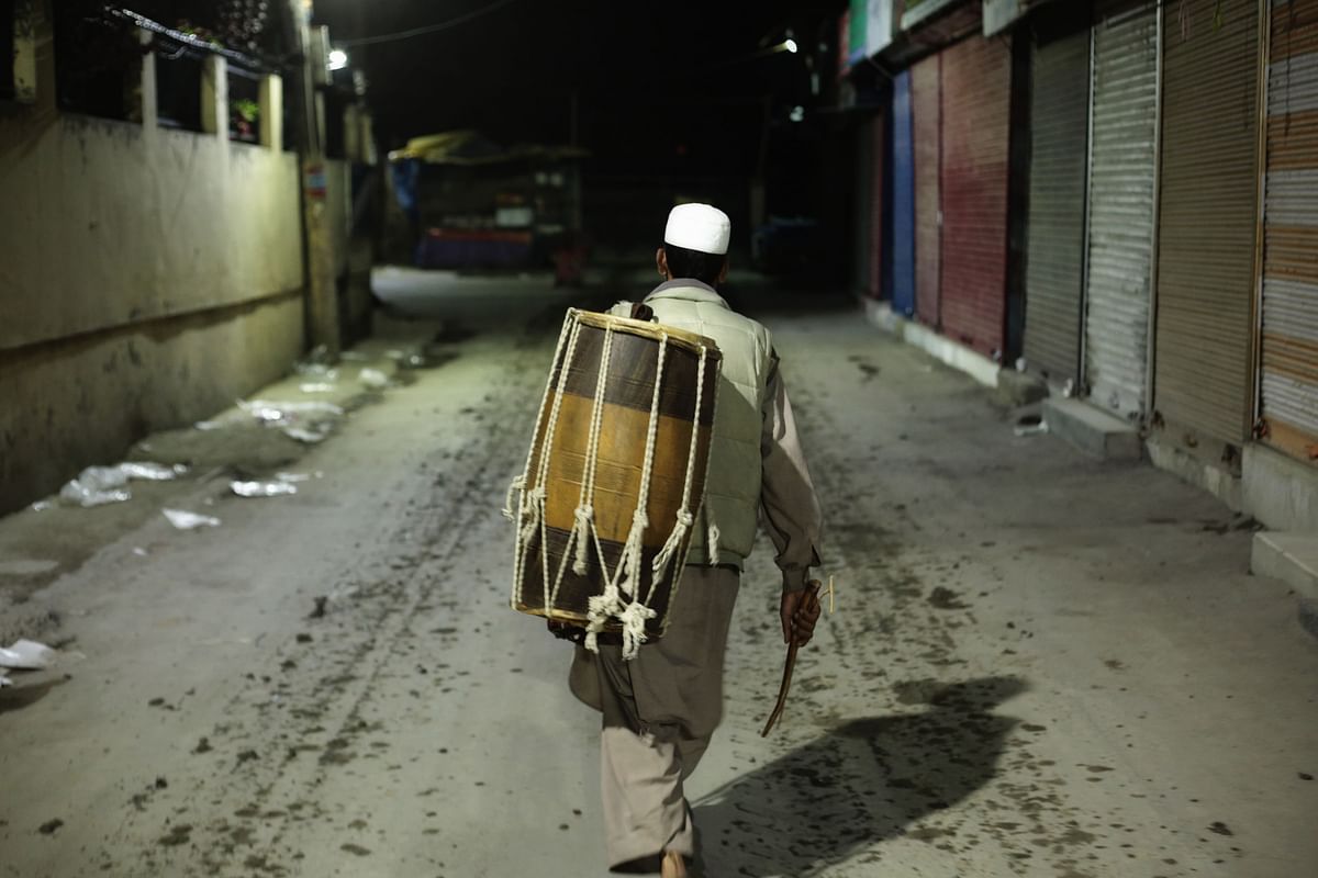 Sahar Khan goes around beating a drum in Srinagar to wake people up for Sahar or the predawn meal in Ramzan.