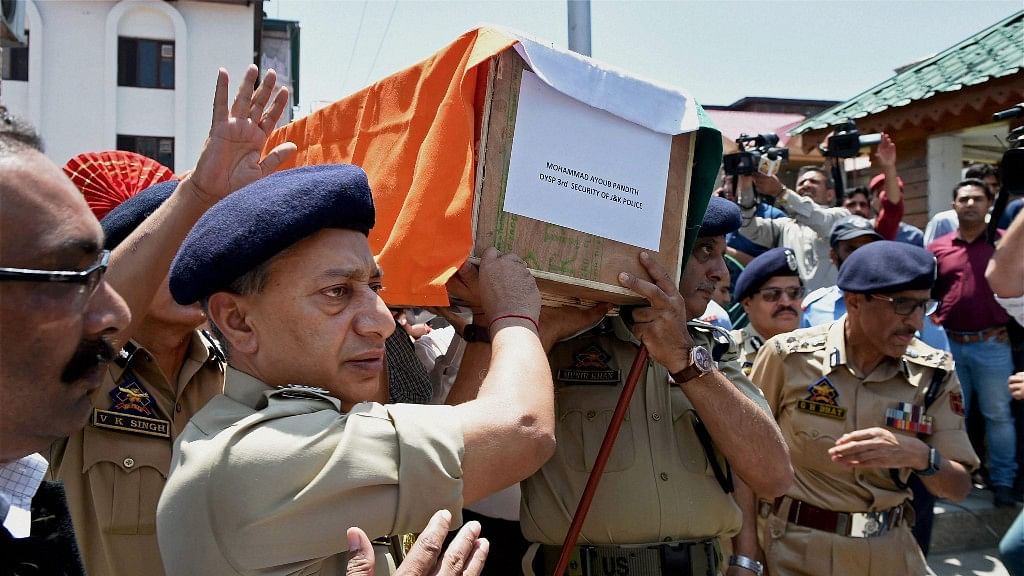 Director General of Jammu and Kashmir Police SP Vaid and other senior officers carrying the coffin of DSP Mohammad Ayub Pandith during a wreath laying ceremony at District Police Lines in Srinagar.&nbsp;