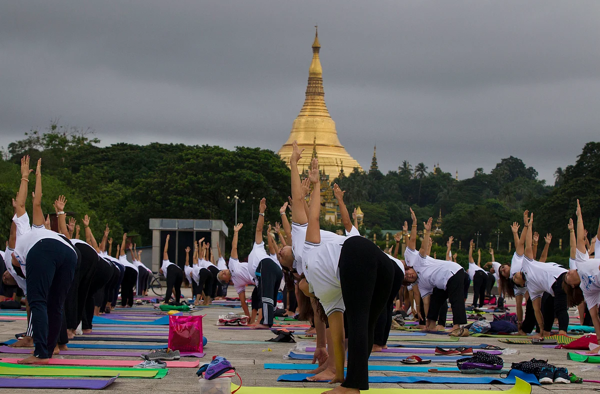 In Pics: People Pause, Stretch and Pose for International ...