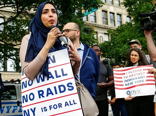 Yemeni American Wadid Hassan speaks to supporters who gathered to protest a travel ban in Union Square, in New York on 29 June 2017.
