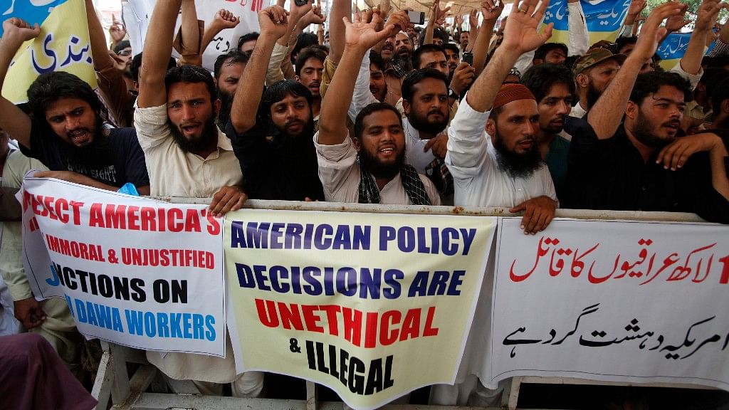 Supporters of the Jamaat-ud-Dawa organisation chant slogans during a protest in Lahore 27 June 2014. (Photo: Reuters)
