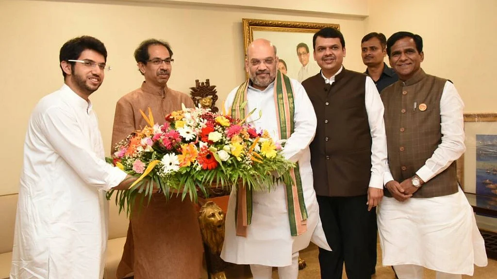 Aditya and Uddhav Thackeray of Shiv Sena with the BJP’s Amit Shah and Maharashtra CM Devendra Fadnavis in a file photo.